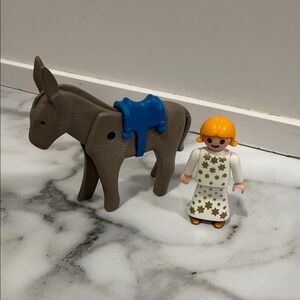 vintage Playmobil Christmas angel and donkey figure from a Nativity set